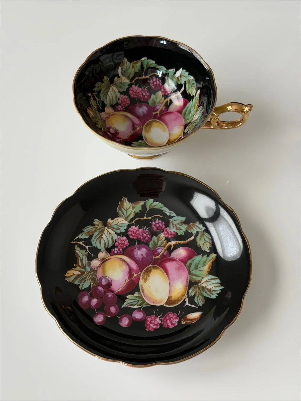 Japan Royal Sealy Vintage Porcelain Black & Gold Fruit Motif Teacup & Saucer Set